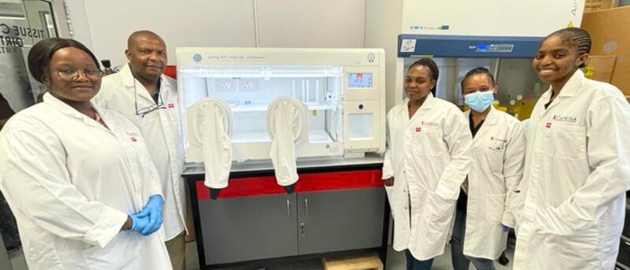 The team at CAPRISA next to their new workstation