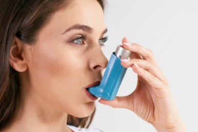 Woman with inhaler