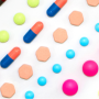 Different pills laid out in lines